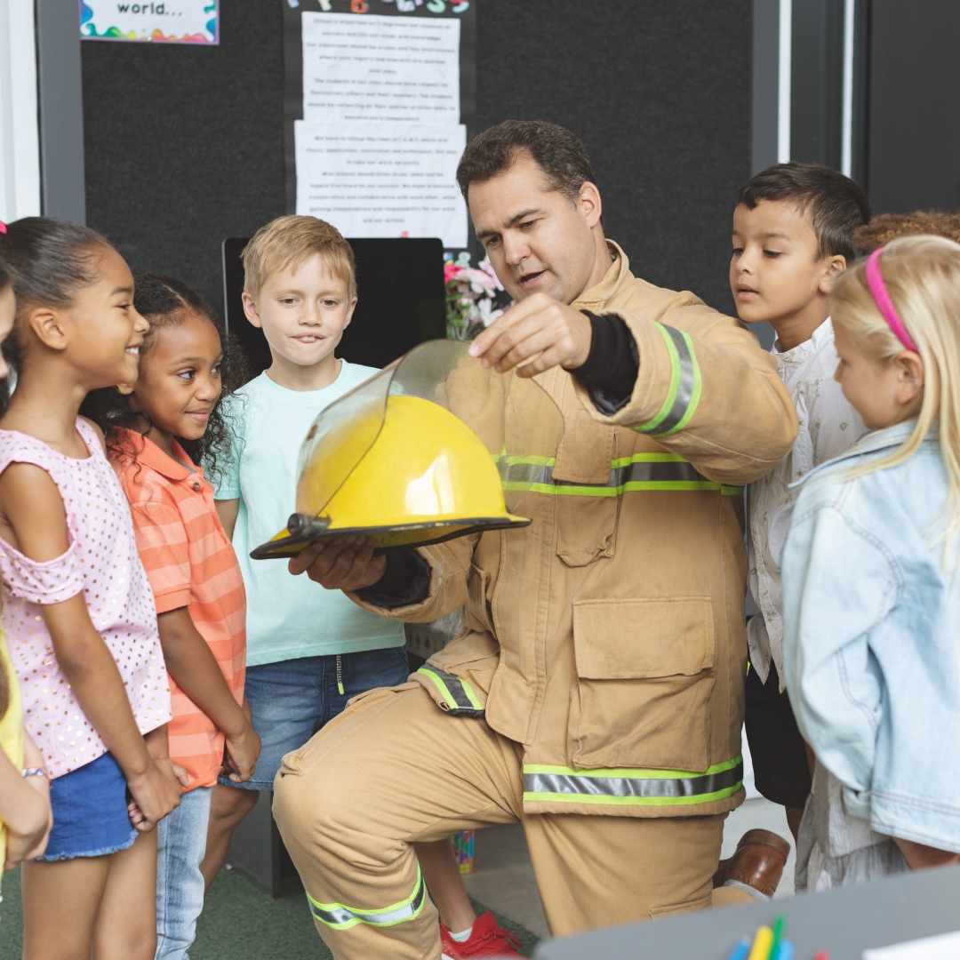 fireman talking to children