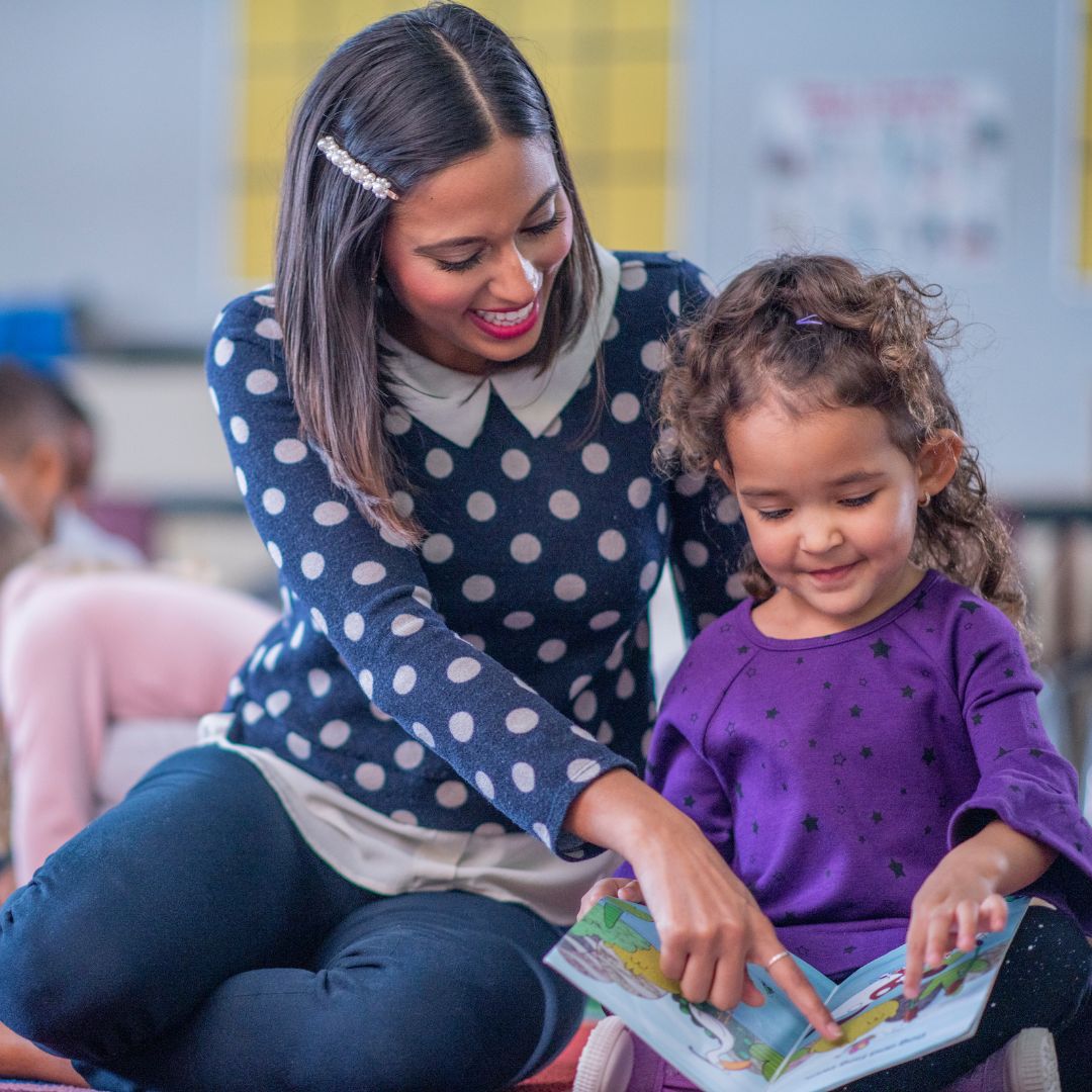 teacher reading to student